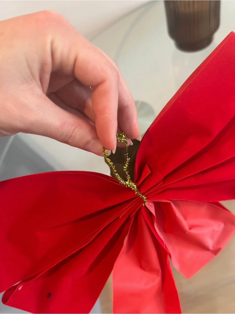 Red Holiday Bow with Pinecone Accent